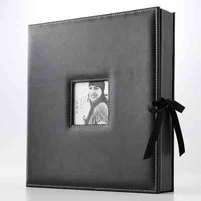 free photo strip scapbook album compliments of our milwaukee based company black and white pic with a black bow has that classic yet modern look picture in middle is in digital format this classic book is included with your purchase, book stlye may vary from model to model